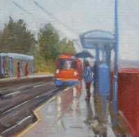 Picture of the Week: <p>Early morning travellers wait for the tram on a wet day behind the railway station.</p>